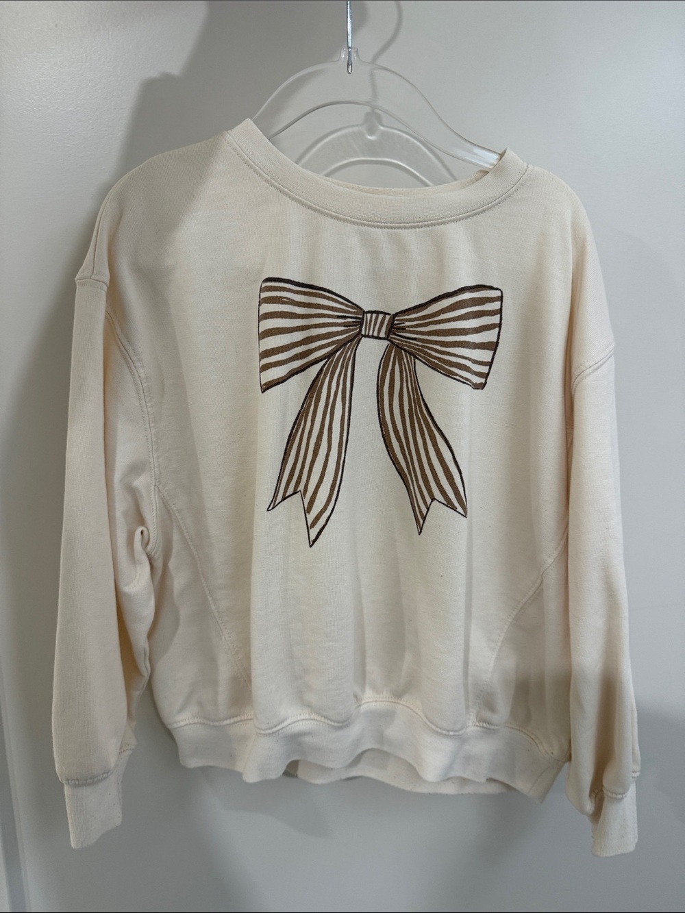 Rylee + Cru Cream Sweater with Brown Bow Graphic